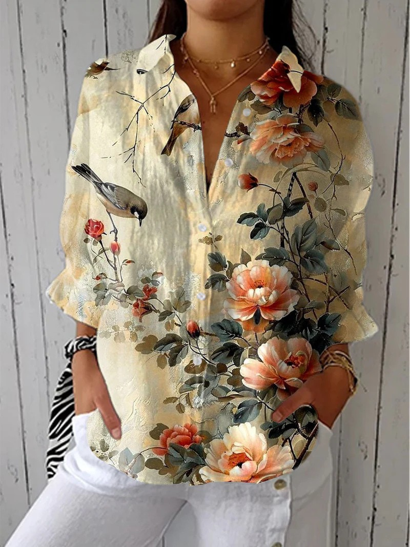 Blusa Rosa con Fiori Eleganti