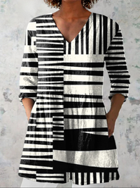 Capri | Blusa lunga con scollo a V