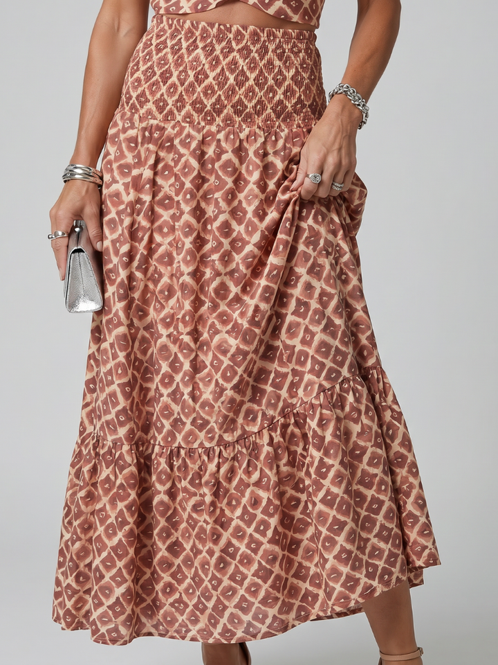 Amira | Abito Midi Cutout con Stampa Geometrica e Collo Halter Incrociato