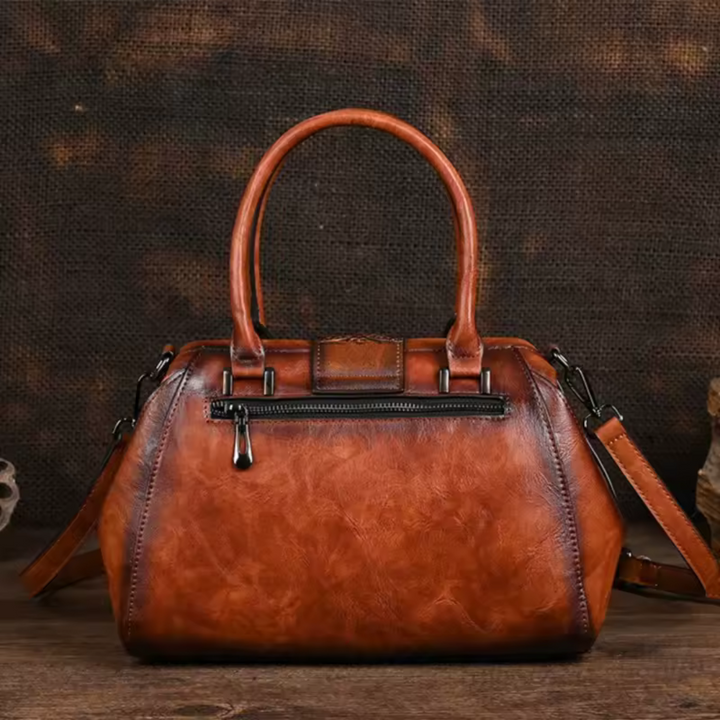 Florina - Borsa a mano in pelle con incisione e motivo floreale