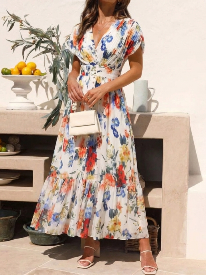 Savannah | Vestito midi floreale con maniche corte e plissettature