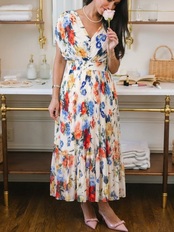 Savannah | Vestito midi floreale con maniche corte e plissettature
