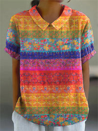 Maya | Blusa a righe con fiori colorati