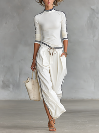 Set di Due Pezzi per Donne: Maglietta Sportiva a Maniche Lunghe con Collo Alto e Pantaloni Larghi con Coulisse